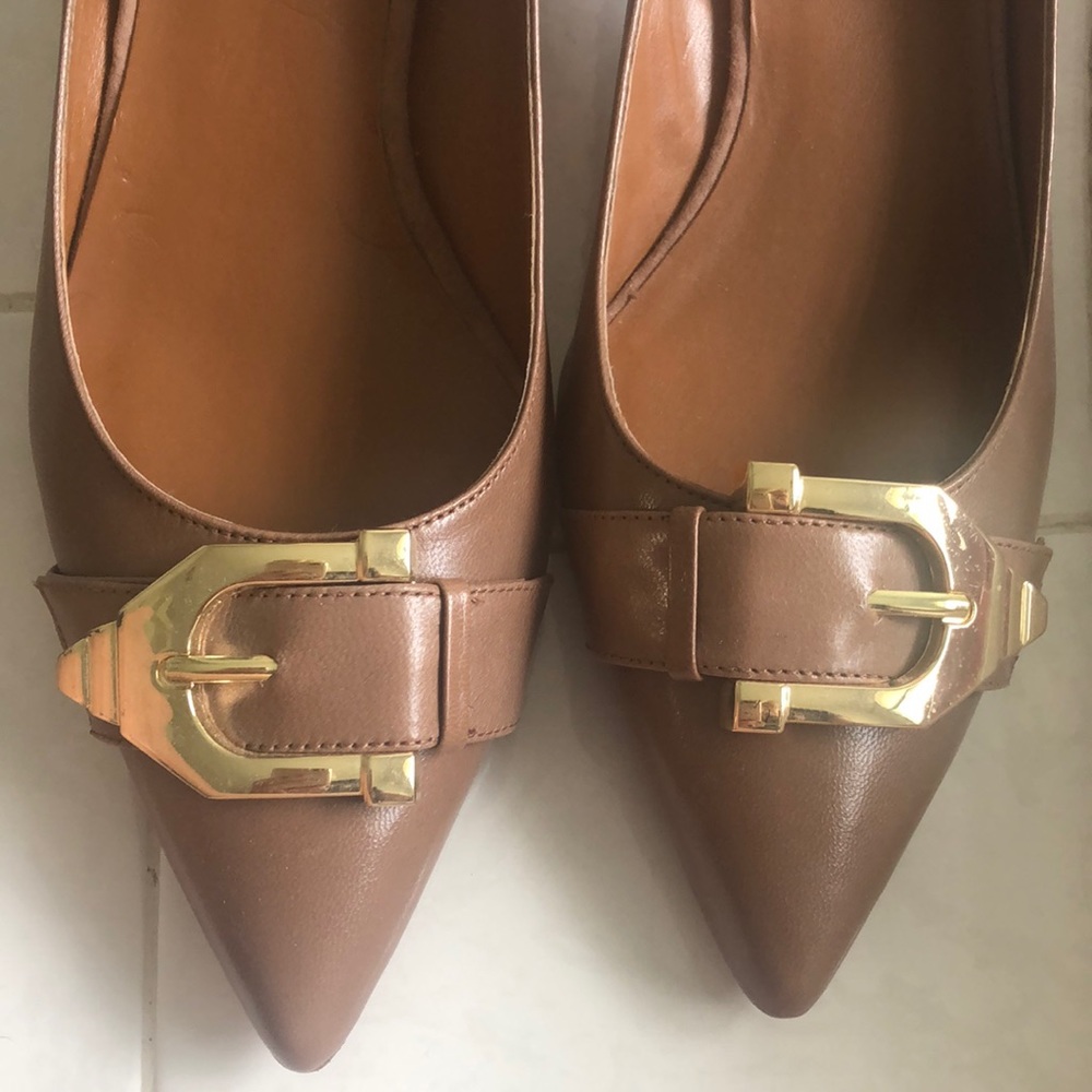 Pretty Nine West heels with gold buckle toe